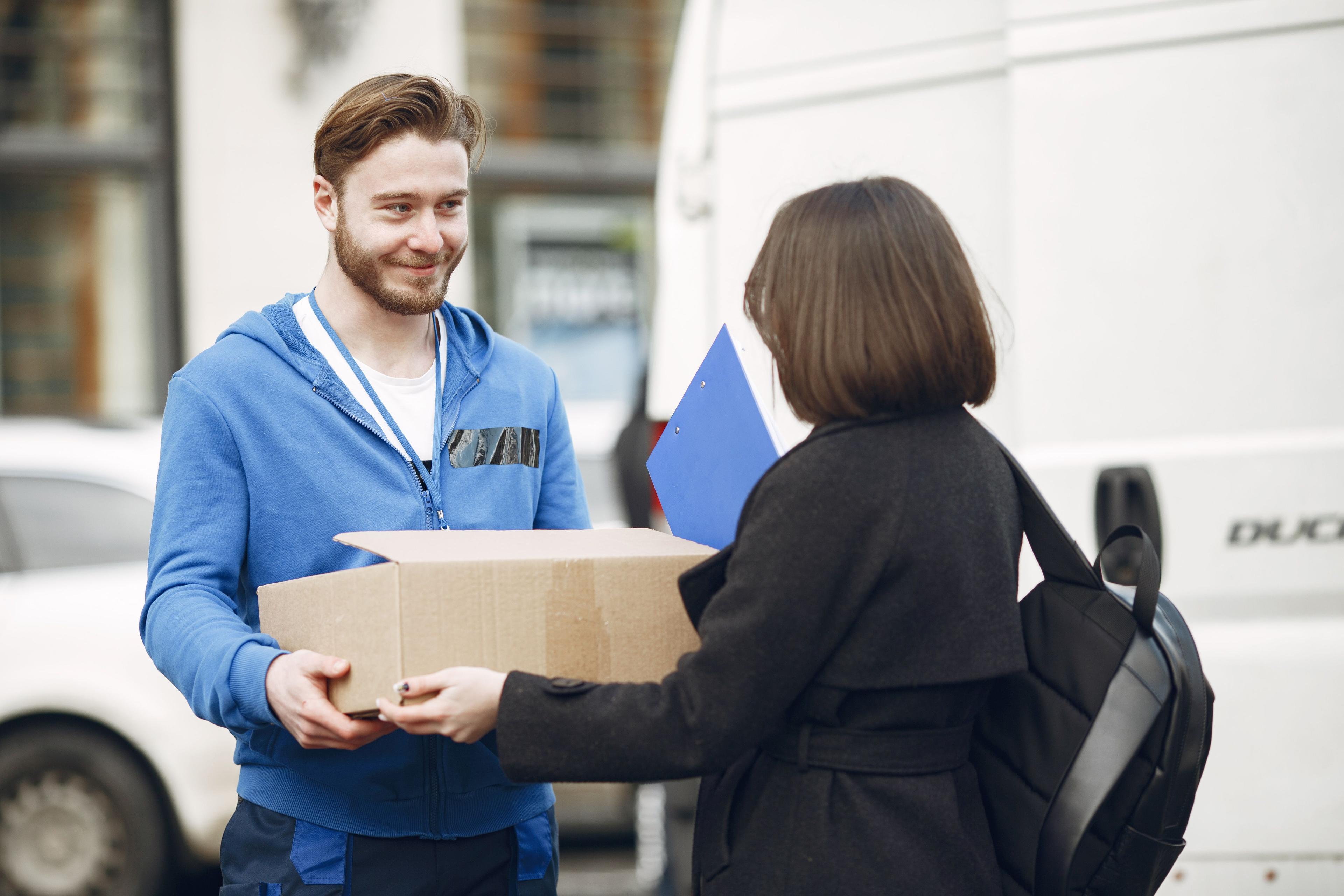 RTO management courier service - courier collecting a return parcel for reverse pickup back to the seller warehouse